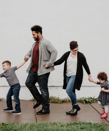 Family walking and holding hands